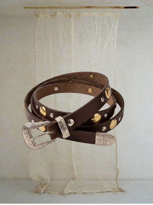 Celeni chocolate brown genuine leather belt with gold and silver studs and a western-style buckle.